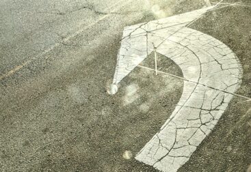 Left turn only sign on the road